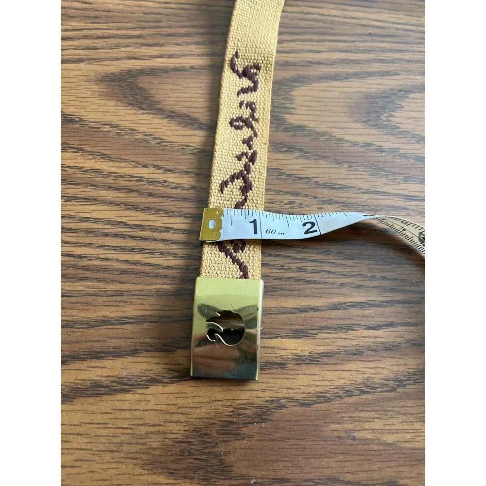Gloria Vanderbilt logo tan stretch belt with gold tone buckle vintage